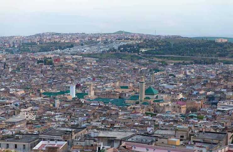 20 Amazing Things To Do In Fez Morocco View over Fez at dusk from the ancient city wall, Morocco.
