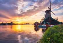 20 Amsterdam Itinerary Ideas For The Perfect Netherlands Trip Windmills At Zaanse Schans In Holland On Sunset.
