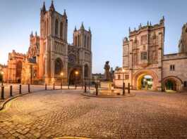 Cathedral and cobblestone square at night