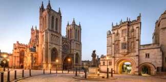 Cathedral and cobblestone square at night