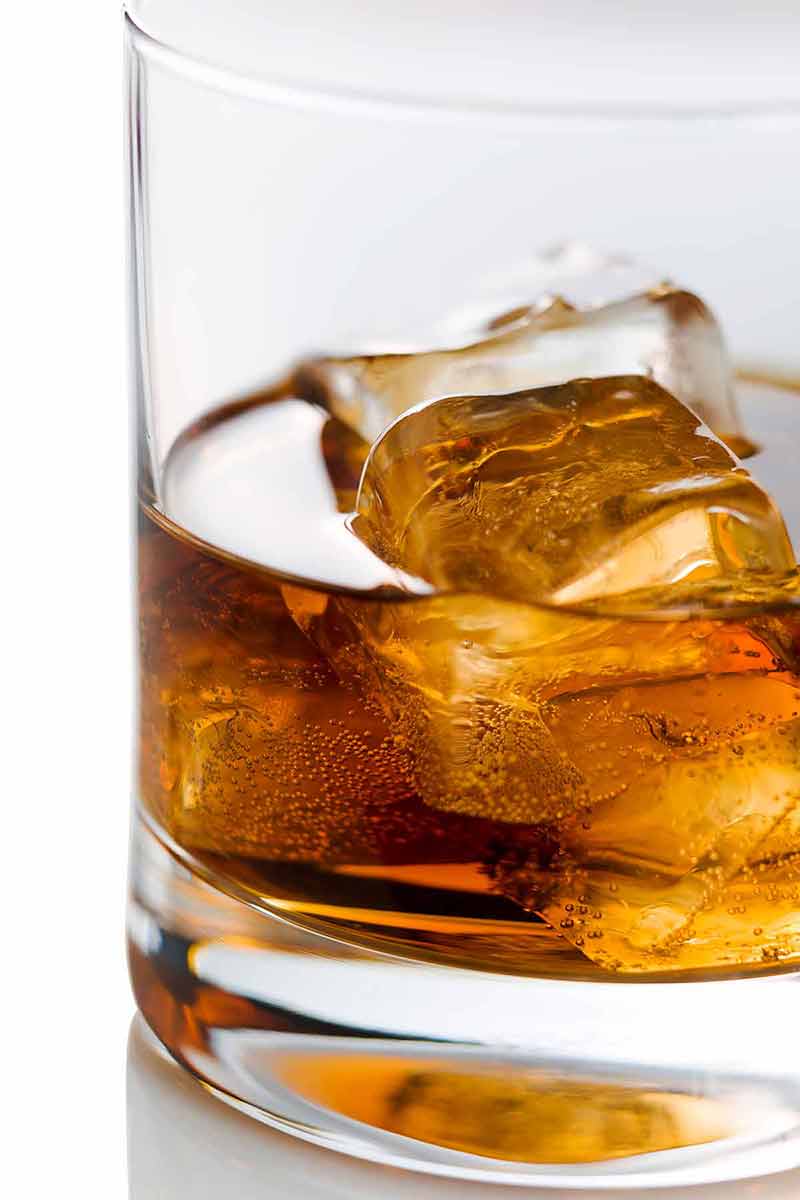American drinks whisky glass Whiskey on the rocks on the white background