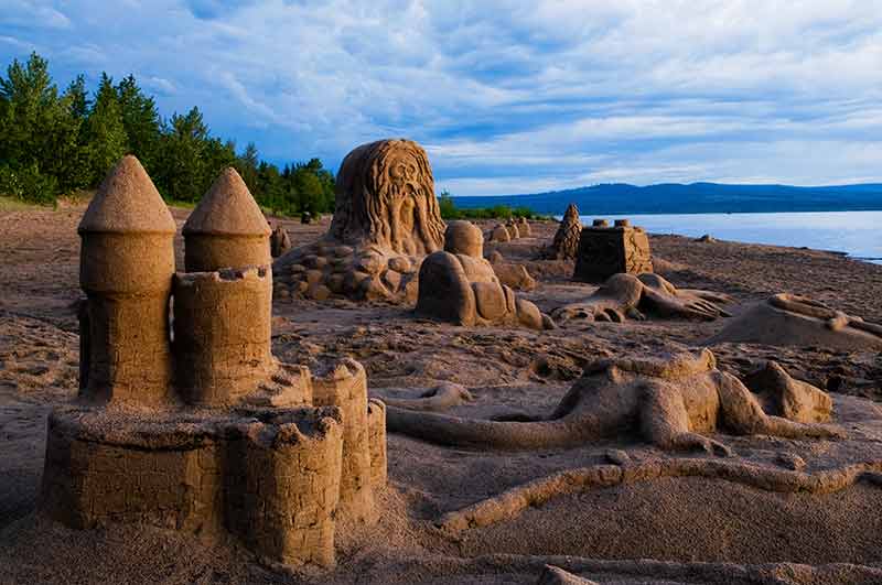 Are there beaches in Canada worth seeing? Devonshire Beach's sand sculptures.