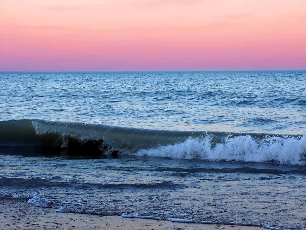 Beaches in illinois waves at sunset