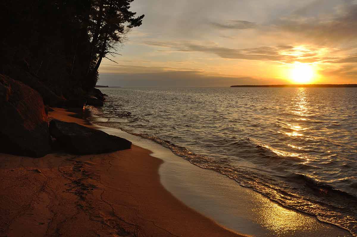 Best Wisconsin Beaches apostle islands lake superior at sunset
