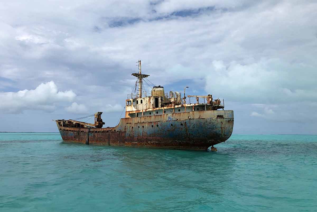 Best beaches turks and caicos wrecked and rusty ship on the water