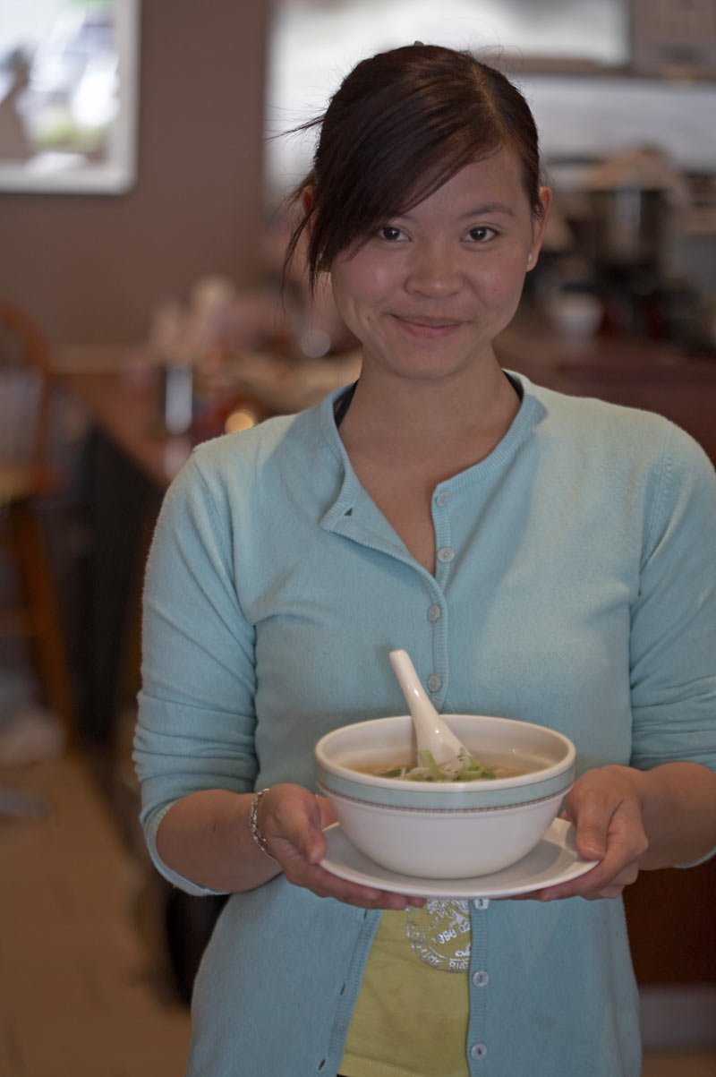 Sydney Cabramatta - Girl with a bowl of beef noodle soup