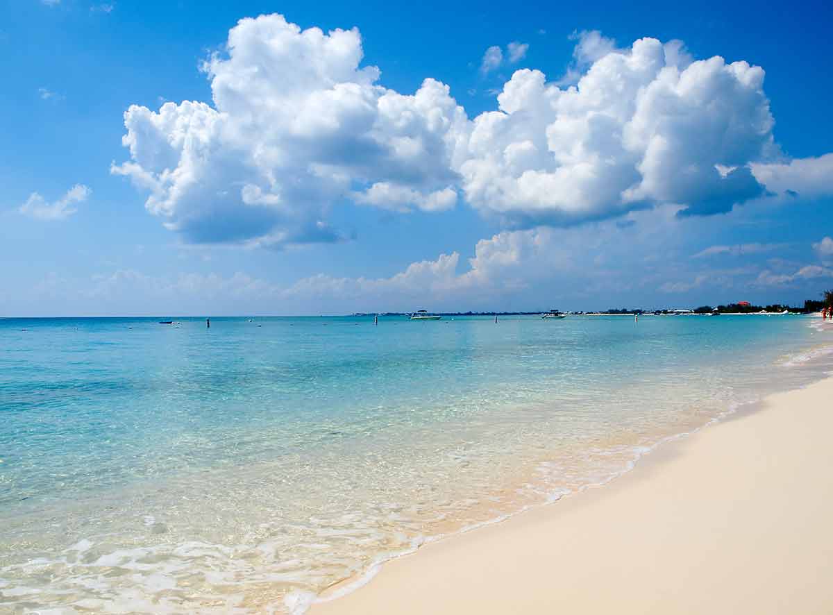 Cayman Island beaches Seven Mile Beach Caribbean beach and clouds