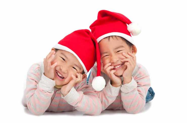 Christmas in China for kids two boys in santa hats