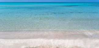 the word Cuba Beaches on the sand
