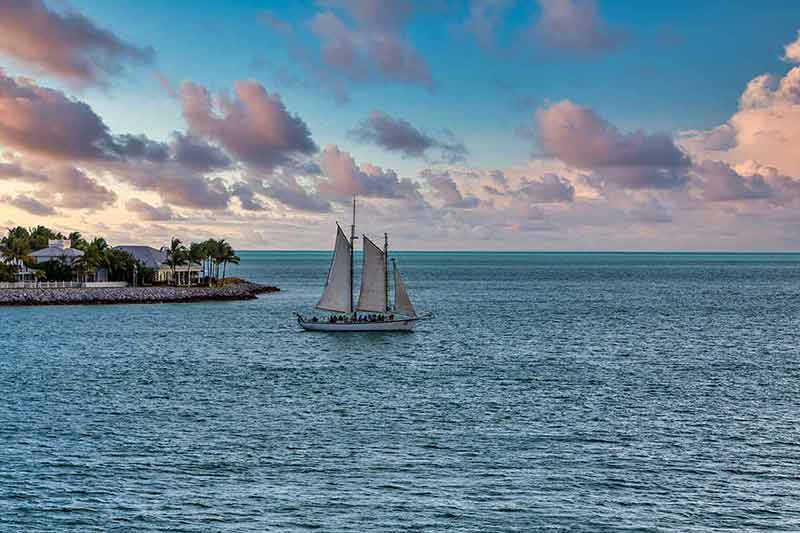 Day trips from Miami to Key West Florida a large old sailboat off the coast of Key West Florida