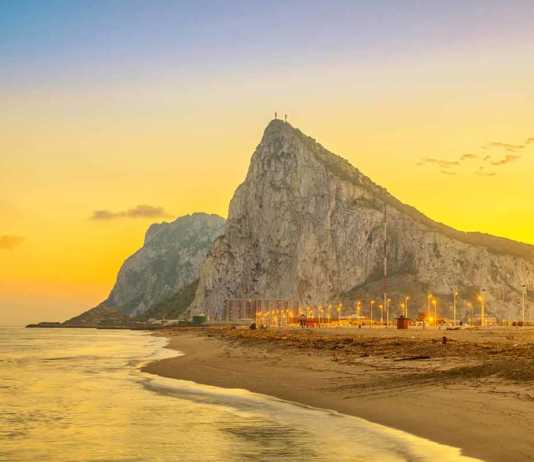 Gibraltar Beaches beneath the Rock at sunset