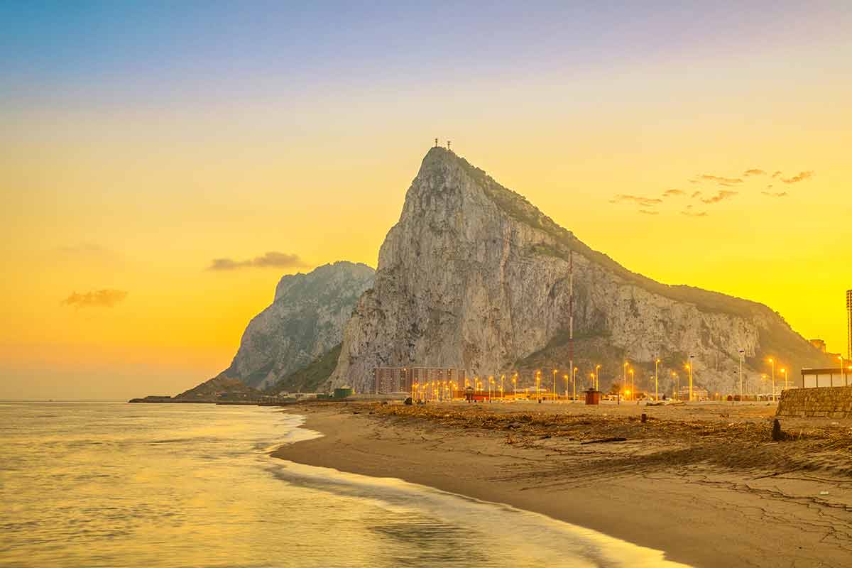 Gibraltar Beaches beneath the Rock at sunset