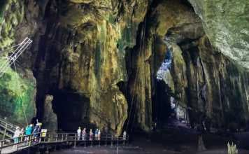 Entering the Gomangton Cave Sandakan Borneo