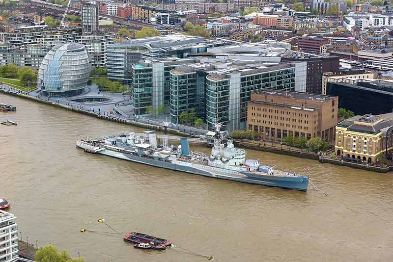 Aerial View Of HMS Belfast On Thames River In London