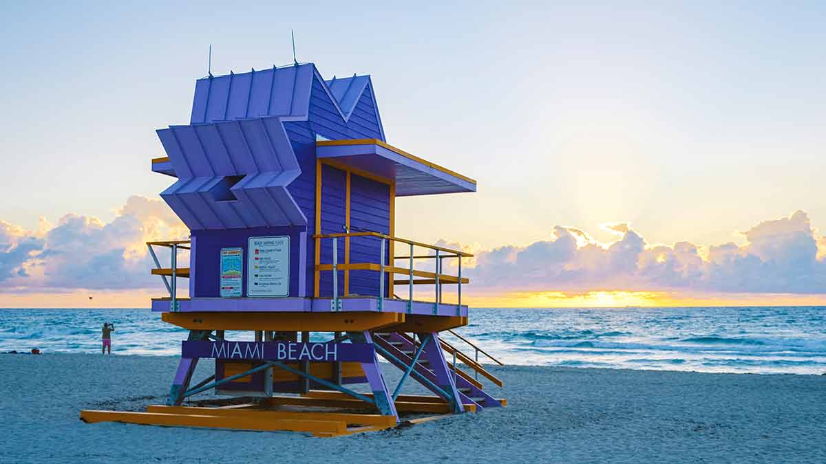 purple lifeguard box on Miami Beach at dusk