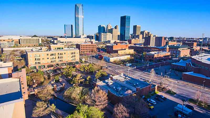 Image of Oklahoma City in morning light from above shopping area.
