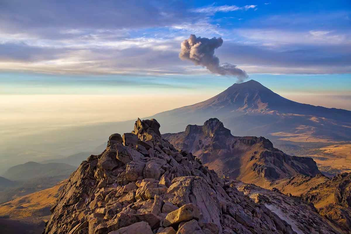 Iztaccíhuat Popocatépetl National Park Mexico steam coming out of the volcano