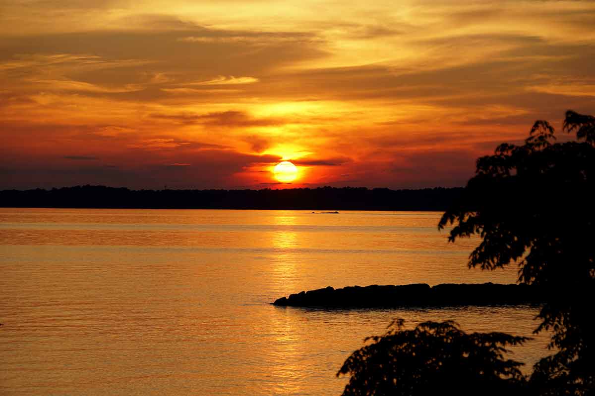 Jamestown beach in Virginia sunset over the rocks