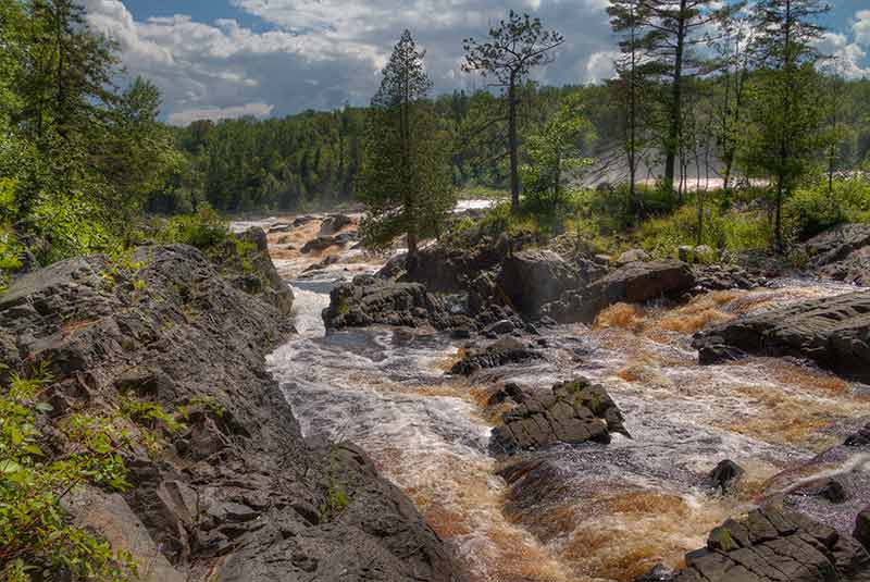 rapids flowing over rocks in Jay Cooke State Park