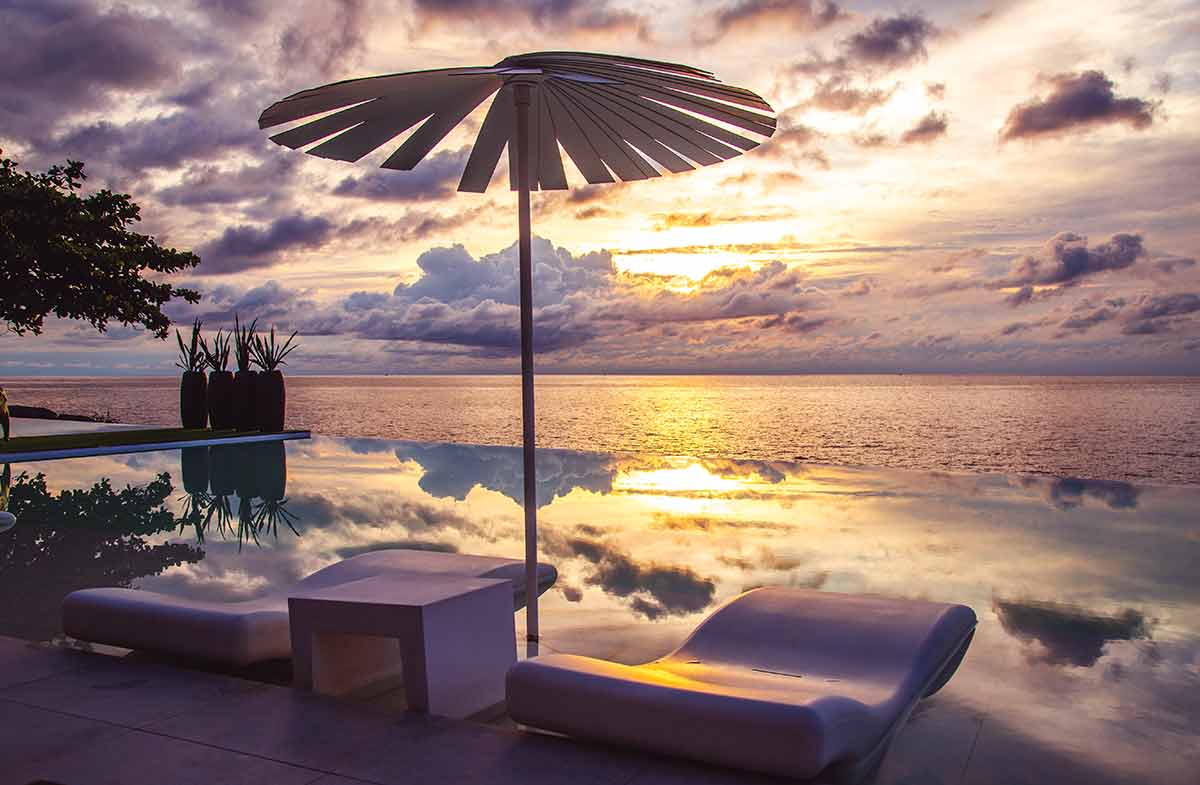 Kata beach lounge and pool at sunset