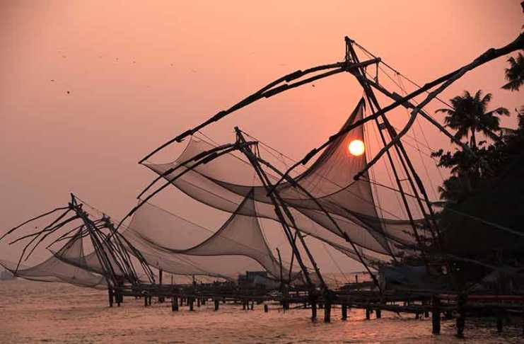 Why Kerala Is Known As God’s Own Country fishing nets in Kochi in Kerala