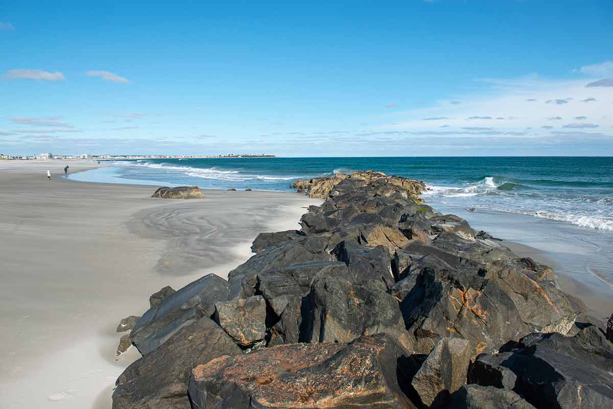 Landmarks in New Hampshire hampton beach rocks and sand