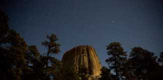 Landmarks in Wyoming Devils Tower under a starry sky