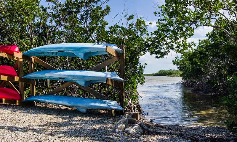 Long Key State Park beaches Florida keys kayaks on a rack near the water