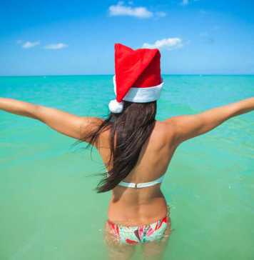 Merry Christmas in Mexico girl with santa hat