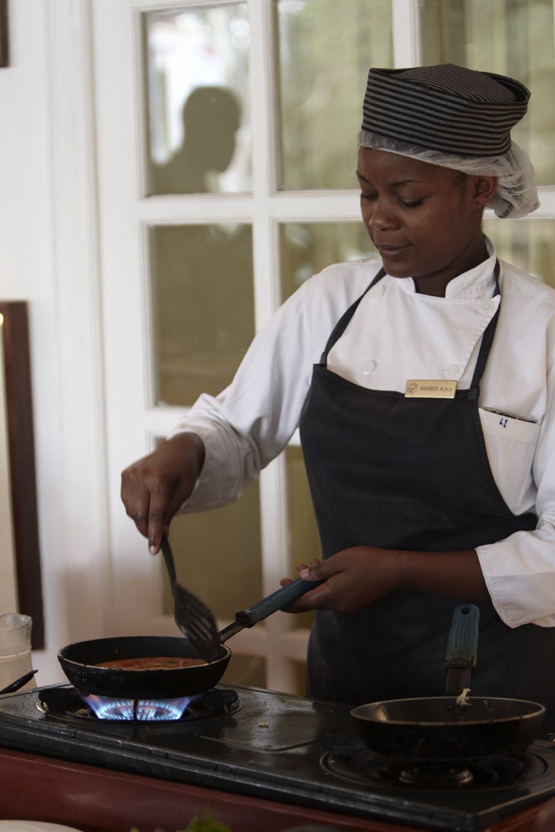 Fairmont The Norfolk Nairobi - Chef cooking for diners at the restaurant