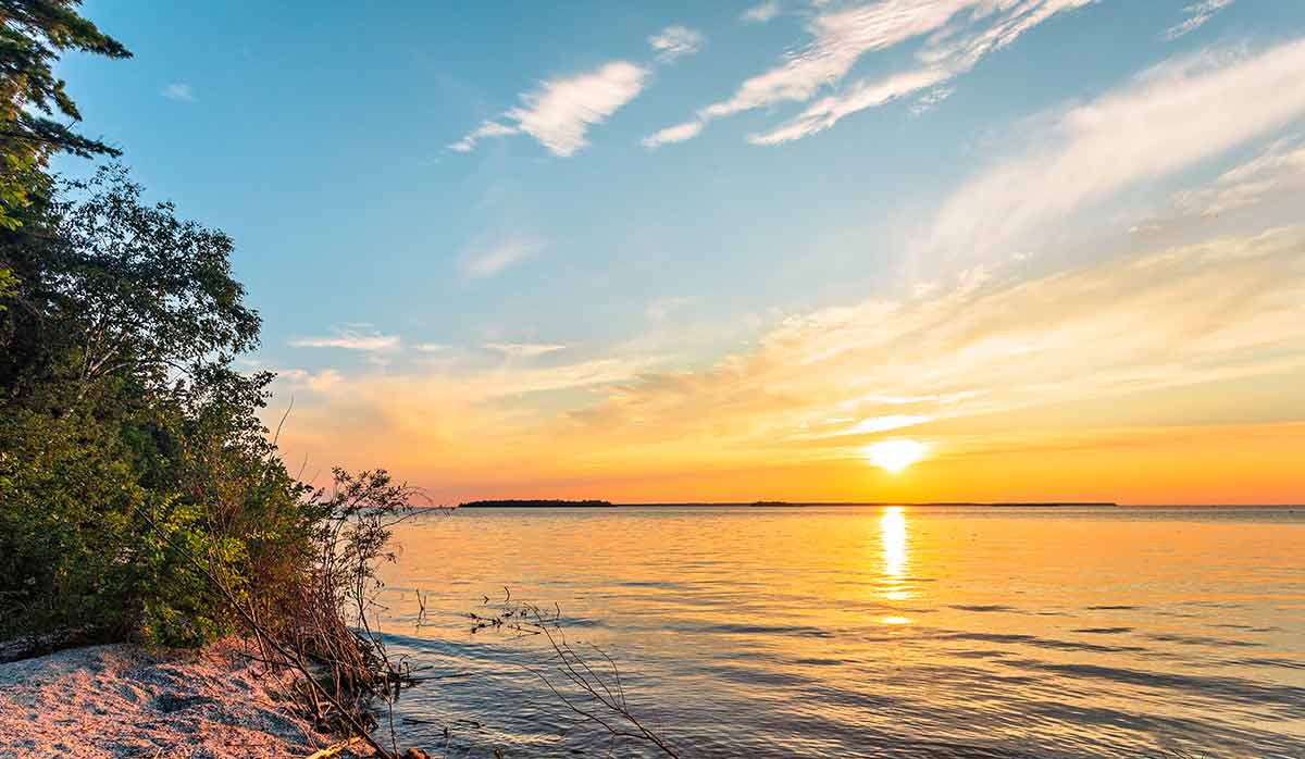 Peninsula State Park Beach Wisconsin orange sunset over the water