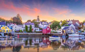 20 Famous New Hampshire Landmarks And Monuments Portsmouth New Hampshire coloiurful timber buildings on the waterfront