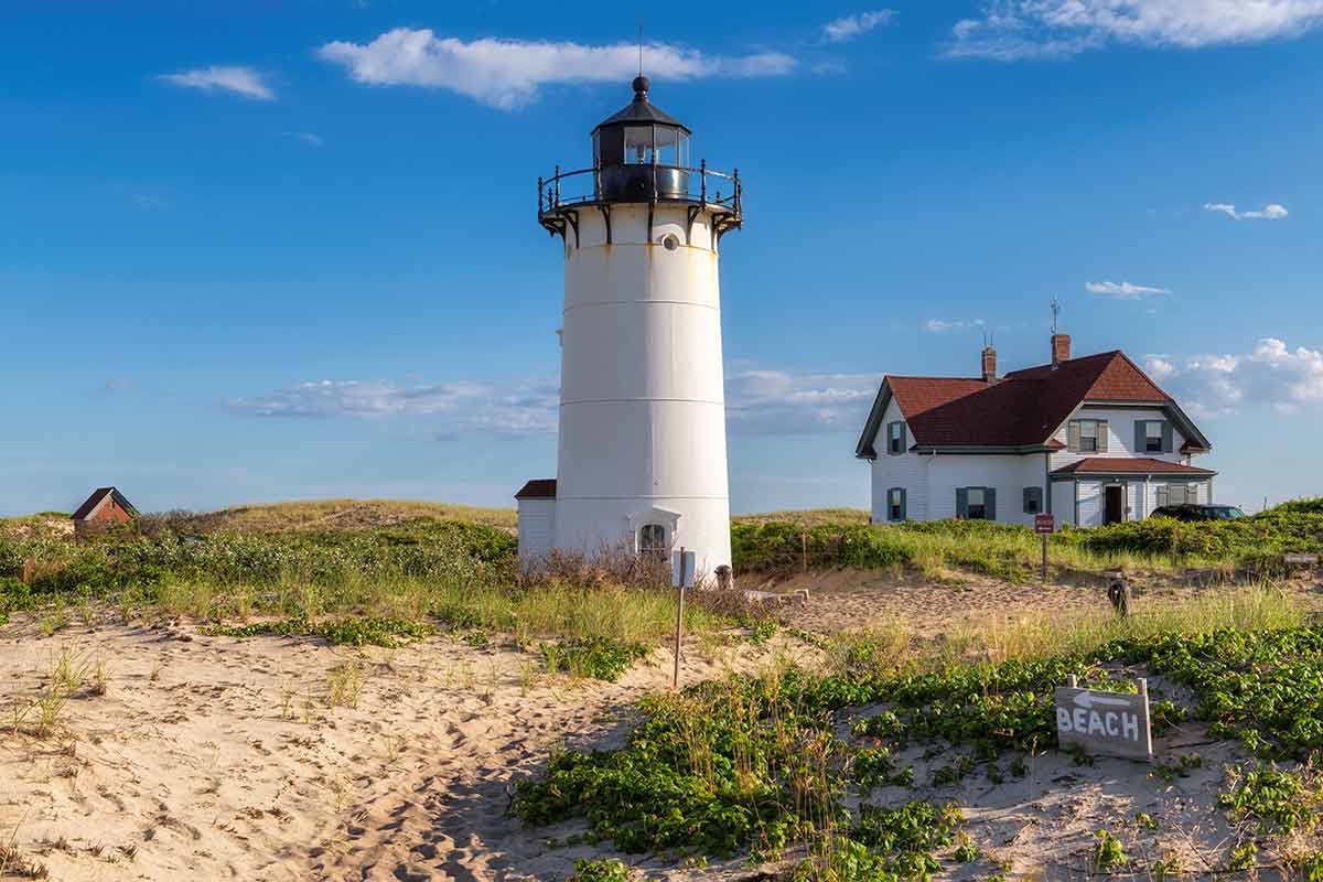 Race point lighthouse beach Massachusetts white with blue sky