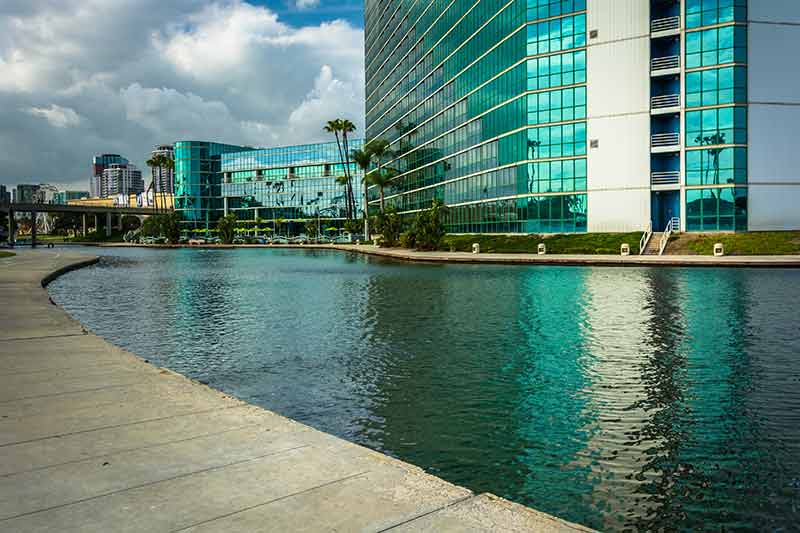 Rainbow Lagoon Park contemporary glass building reflected in the water
