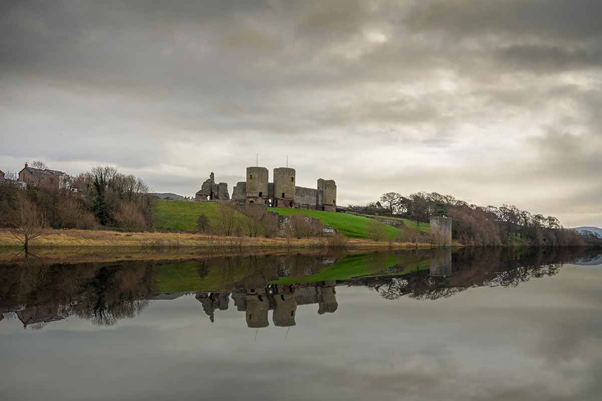 Rhuddlan Castle Wales reflected in the water