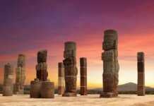 Ruins Of Tula columns against purple sky