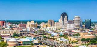 20 Louisiana Cities And Towns Where The Culture Is Impossible To Ignore Shreveport aerial view with bridge and river