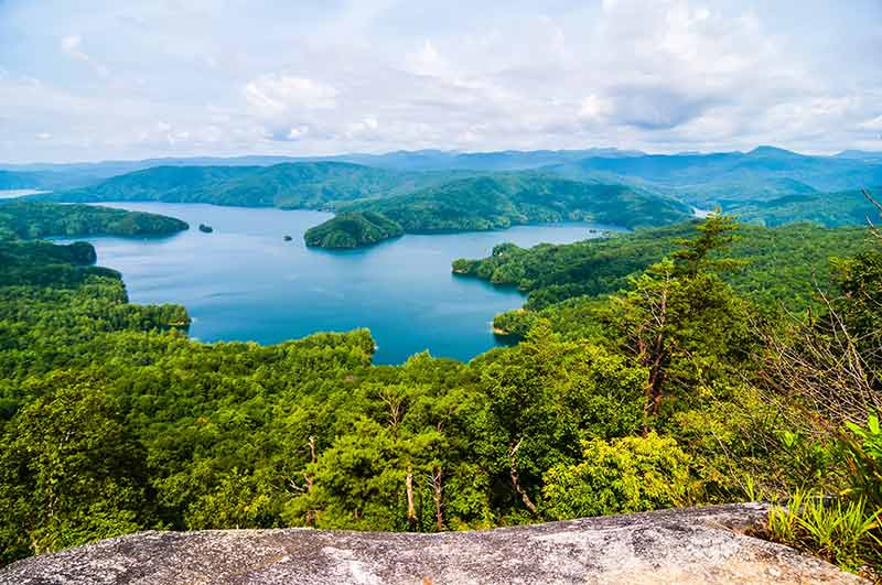 South Carolina natural landmarks (blue Lake jocasse gorge framed by green trees)