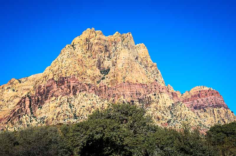 Soaring mountain in Spring Mountain Ranch State Park Nevada against blue sky