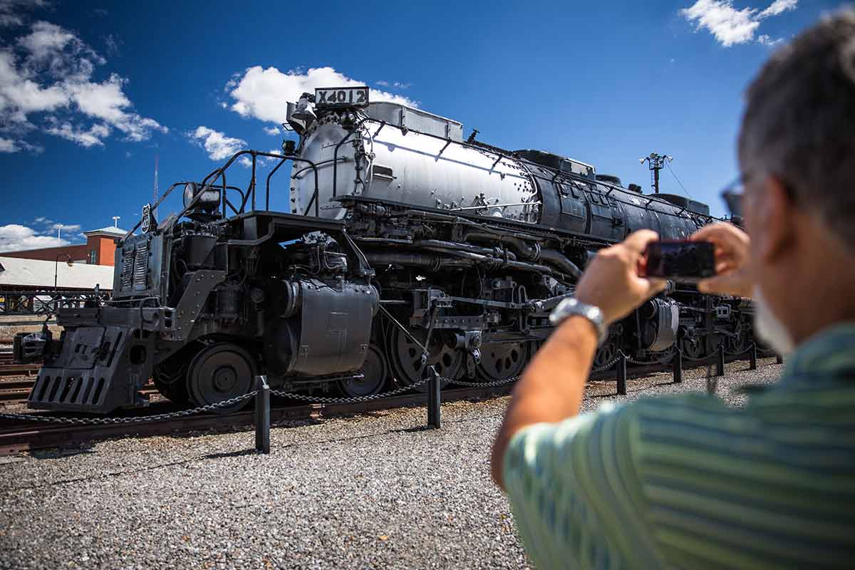 Steamtown National Historic Site man taking a photo of the locomotive