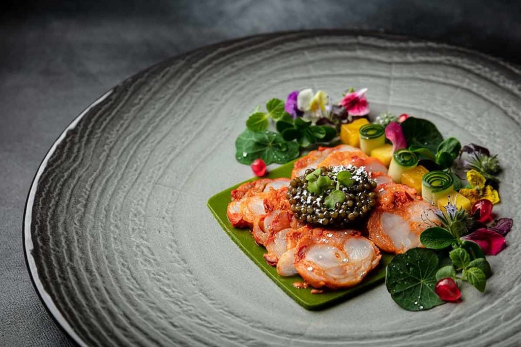 The Golden Peacock French Britany blue lobster, beluga caviar, yoghurt, cloves, cinnamon, mint coriander chutney and tamarind drops 天多尼烤法國藍龍蝦薄片伴大白鱘龍魚子醬