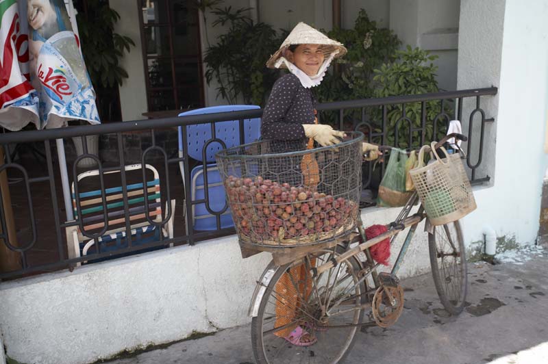 woman on a bicycle in Saigon