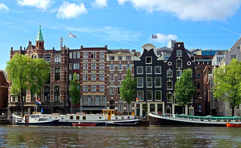 Canals And Typical Dutch Houses