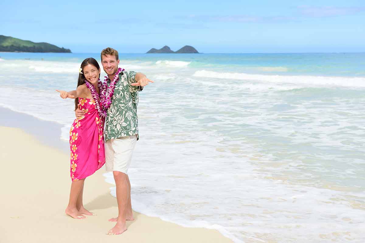 are beaches open in hawaii Aloha couple on Hawaiian beach