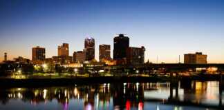20 Arkansas Cities And Towns That Might Completely Surprise You skyline of little rock after dark