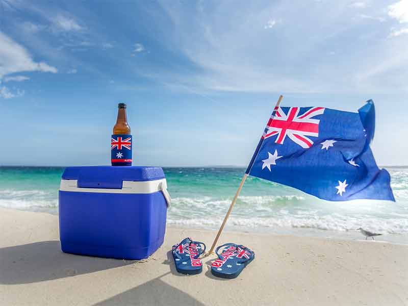 australian christmas trivia - thongs, beer, esky and aussie flag on a beach estions and answers