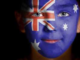 Australian flag painted on face of child