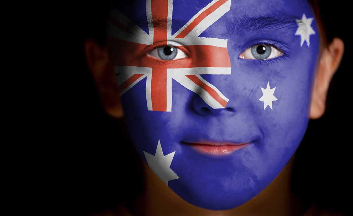 Australian flag painted on face of child