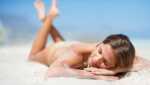 7 Amazing Gibraltar Beaches woman lying on the sand on the beach
