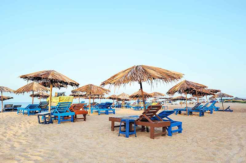 beaches in asia to visit Beach umbrellas and deckchairs in Goa